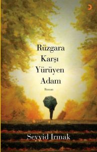 Rüzgara Karşı Yürüyen Adam                                                                                                                                                                                                                                     